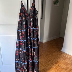 Never worn Ro’sGarden maxi dress. Beautiful black with floral pattern.